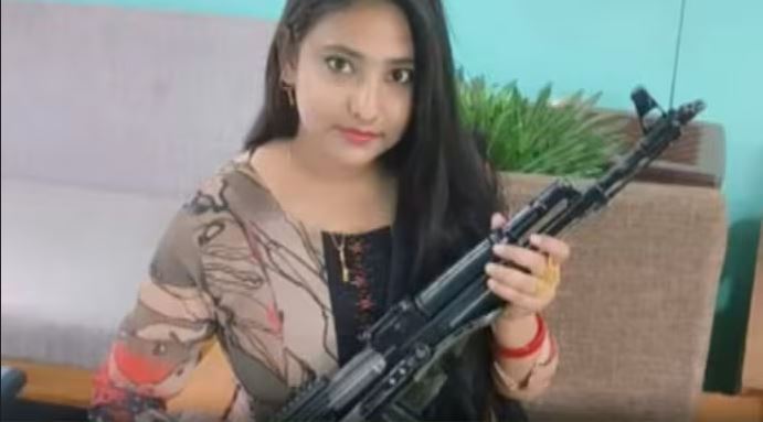 tmc leaders wife with ak47